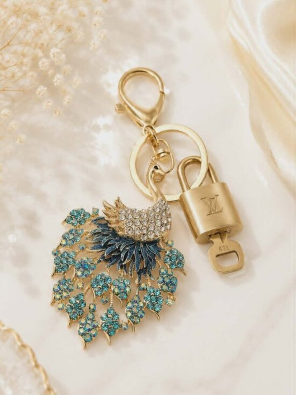 Authentic Louis Vuitton Gold Lock 🔒 Unbranded Peacock Keychain Bag Charm LV - Picture 1 of 9